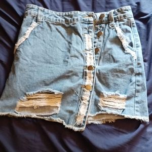 Forever 21 Denim distressed blue jean mini skirt. Button up with fringes. S